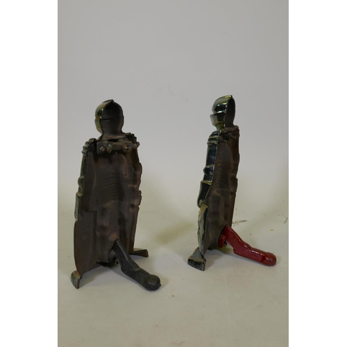 278 - A pair of early C20th lustre plated cast metal fireside companions, 35cm high