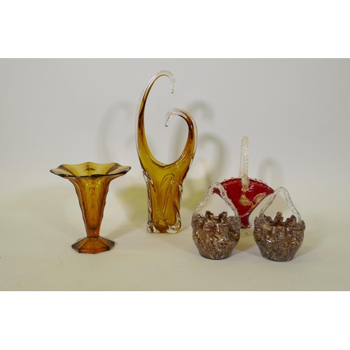 30 - An amber glass vase, 49cm high, Bohemian glass basket shaped vase, and two others