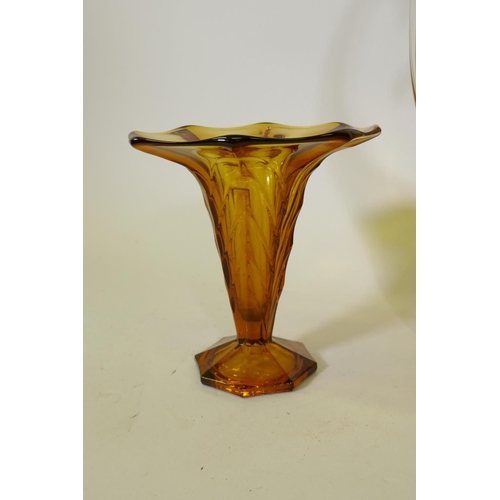 30 - An amber glass vase, 49cm high, Bohemian glass basket shaped vase, and two others