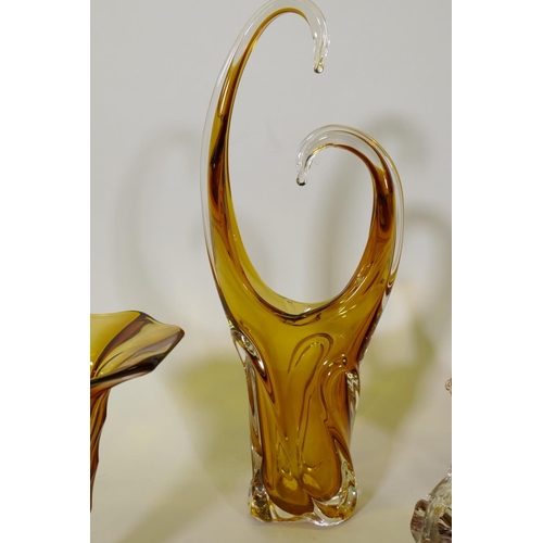 30 - An amber glass vase, 49cm high, Bohemian glass basket shaped vase, and two others