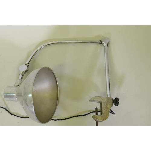 31 - A vintage adjustable chrome and aluminium bench light with clamp fitting, 35 x 58cm