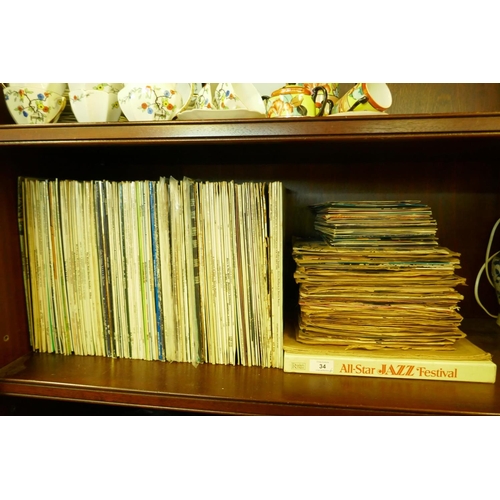 34 - A quantity of vintage and older jazz, rock, pop and classical shellac 78s, vinyl LPs and 7