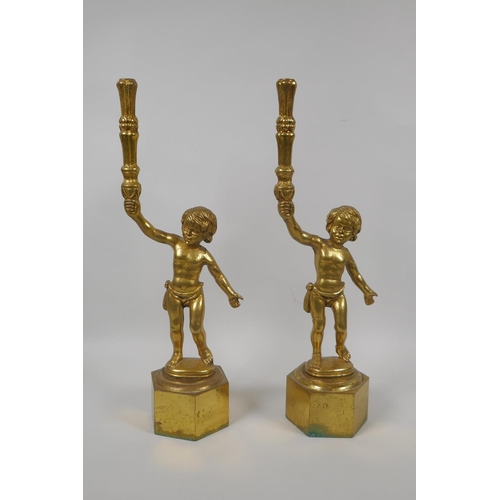 44 - A pair of gilt brass putti lamp bases, 38cm high