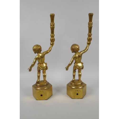 44 - A pair of gilt brass putti lamp bases, 38cm high