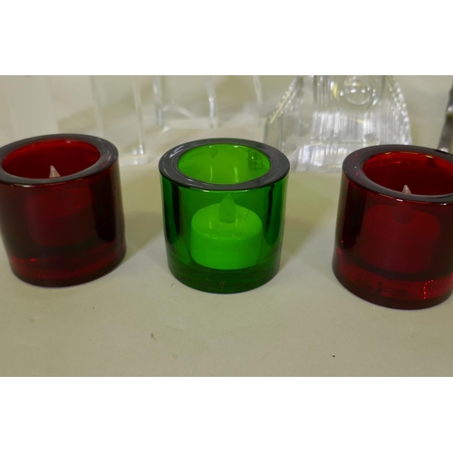 47 - A pair of Finnish Iittala glass candlesticks, 22cm high, a paperweight, two Marimekko glass nightlig... 