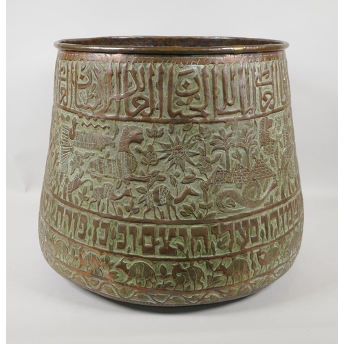 50 - An antique Cairo ware copper planter, with repousse decoration of Egyptian figures, landmarks and an... 