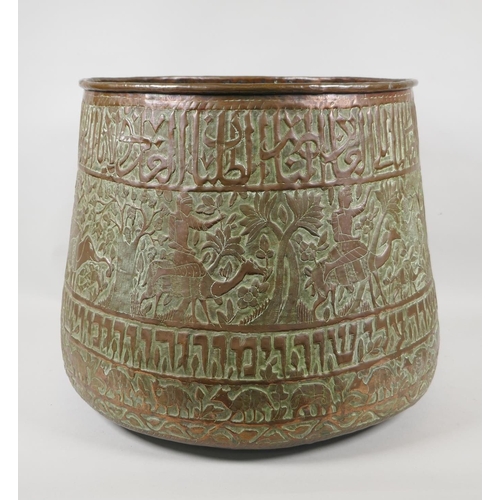 50 - An antique Cairo ware copper planter, with repousse decoration of Egyptian figures, landmarks and an... 