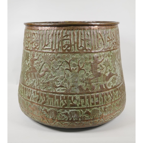 50 - An antique Cairo ware copper planter, with repousse decoration of Egyptian figures, landmarks and an... 