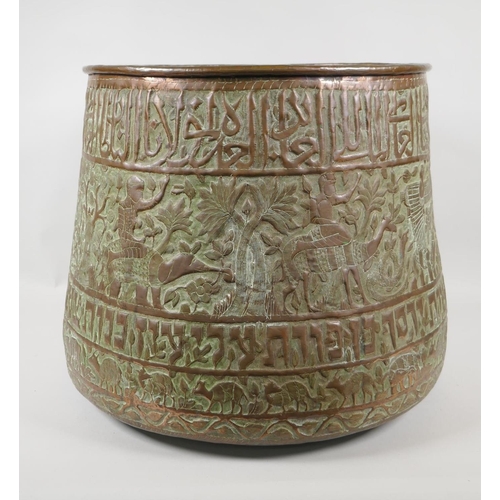 50 - An antique Cairo ware copper planter, with repousse decoration of Egyptian figures, landmarks and an... 