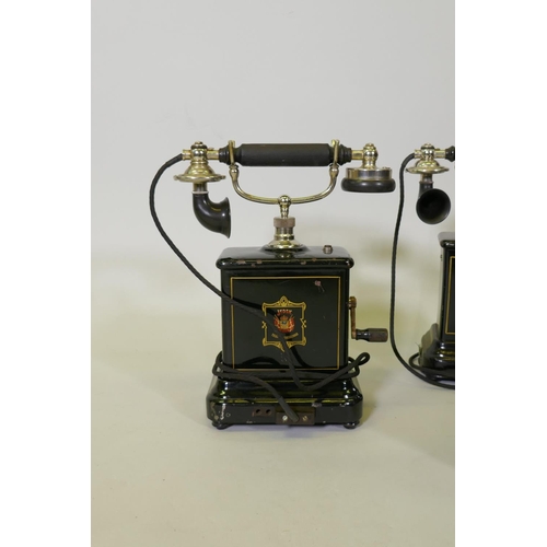 52 - Four early C20th Danish JYDSK Telefon Aktieselkab enamelled and chromed metal