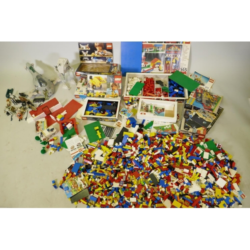 54 - A large quantity of Lego and Star Wars figures and machines