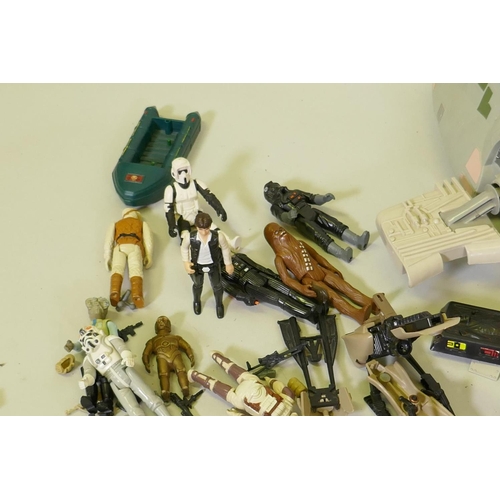 54 - A large quantity of Lego and Star Wars figures and machines