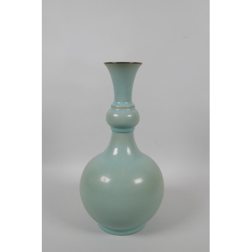 55 - A Chinese Ru ware style porcelain vase with garlic head shaped neck, 29cm high