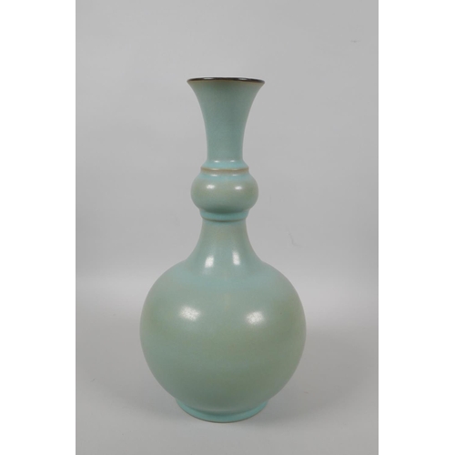 55 - A Chinese Ru ware style porcelain vase with garlic head shaped neck, 29cm high