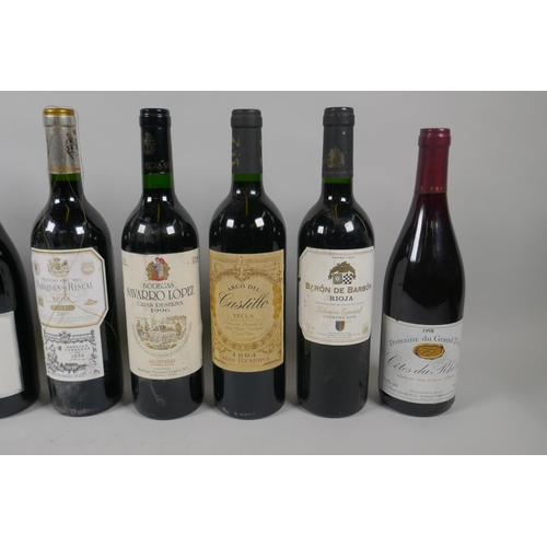 56 - Eight bottles of red wine to include a bottle of Marques de Riscal Rioja Reserva 2007, a bottle of E... 