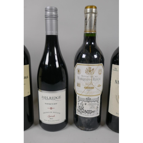 56 - Eight bottles of red wine to include a bottle of Marques de Riscal Rioja Reserva 2007, a bottle of E... 