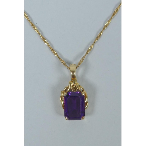 601 - An Italian 14ct gold and amethyst? pendant necklace, chain 5.2g, 81cm long, pendant 4.4g gross