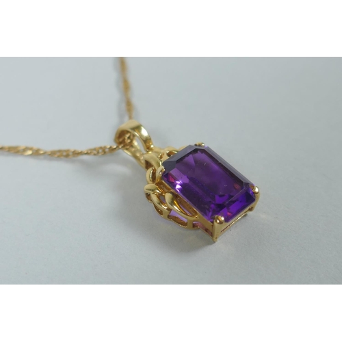 601 - An Italian 14ct gold and amethyst? pendant necklace, chain 5.2g, 81cm long, pendant 4.4g gross