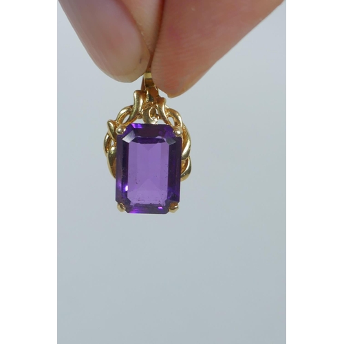 601 - An Italian 14ct gold and amethyst? pendant necklace, chain 5.2g, 81cm long, pendant 4.4g gross