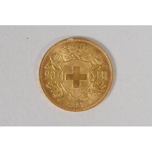 604 - A 20 Swiss Franc gold coin, 1927, 6.46g