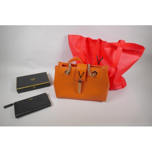 61 - A Mario Valentino 'Divine' handbag and branded protective bag, together with a leather Osprey purse ... 