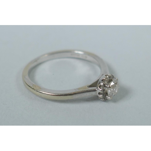 621 - A 9ct white gold diamond solitaire ring, approx ¼ct, size M