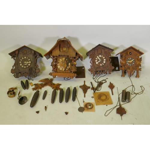 622 - Four Black Forest cuckoo clocks for repair, largest 40cm high