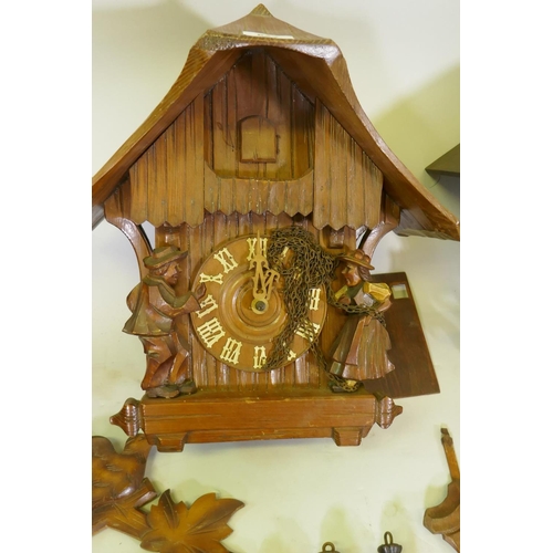 622 - Four Black Forest cuckoo clocks for repair, largest 40cm high