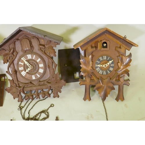 622 - Four Black Forest cuckoo clocks for repair, largest 40cm high