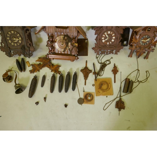 622 - Four Black Forest cuckoo clocks for repair, largest 40cm high