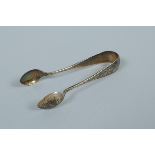 623 - A Georgian hallmarked silver spoon by Solomon Hougham, (London, 1810, 78g), a pair of Scottish silve... 