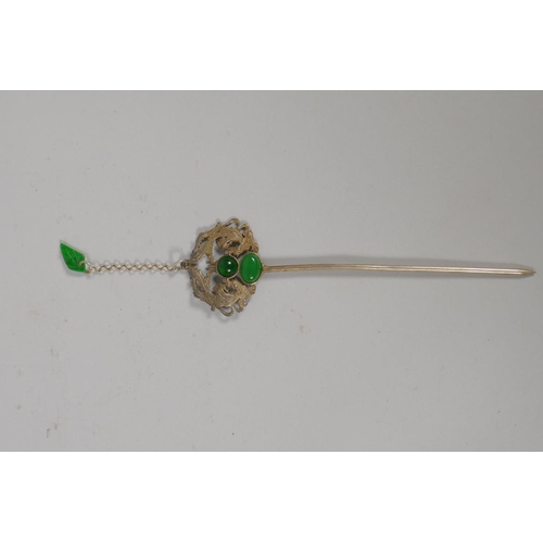 624 - A Chinese white metal hairpin with twin phoenix decoration and set with jade, 17cm