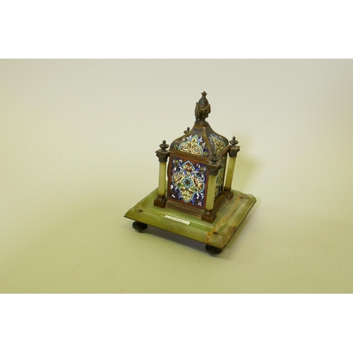 631 - A French champleve enamel inkwell, fitted with a clock and mounted on an alabaster base, 22cm high