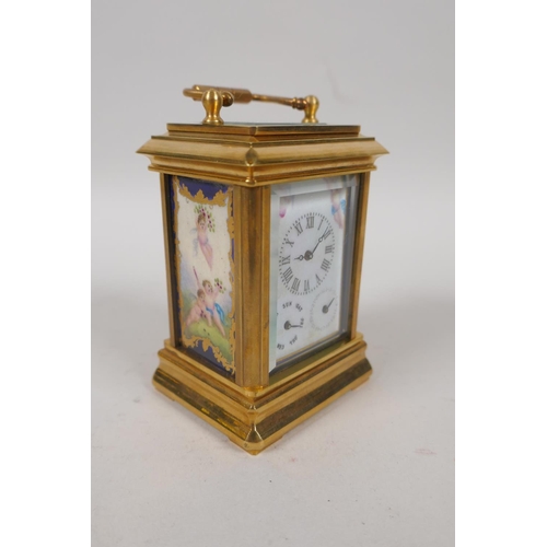 633 - A gilt brass carriage clock set with Sevres style pottery panels, 8cm high, the dial with smaller da... 