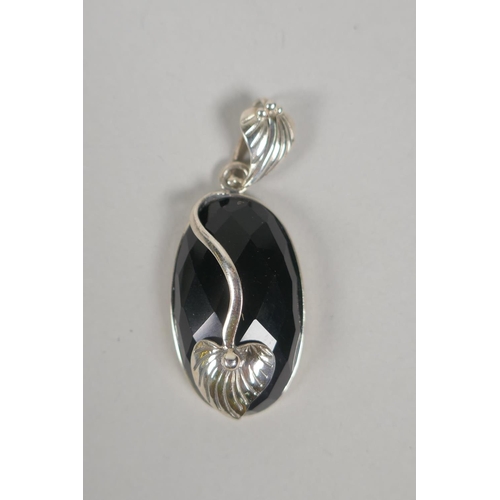 637 - An Art Nouveau style 925 silver and black onyx pendant, 5cm drop