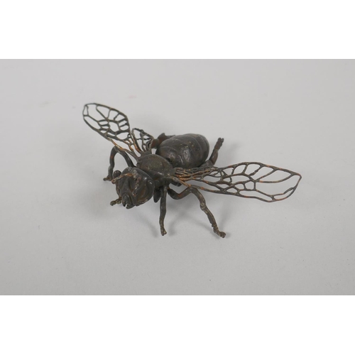 64 - A Japanese style bronze okimono wasp, 11cm wide