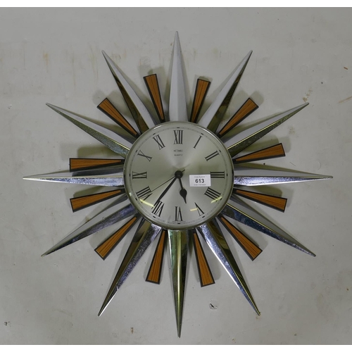 648 - A vintage Metamec battery operated Quartz sunburst wall clock, AF two blade detached, 60cm diameter