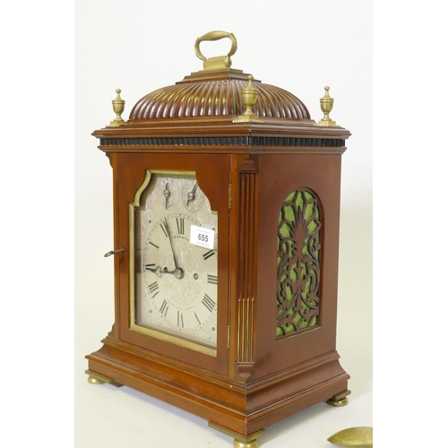 655 - An early C20th J.W. Benson eight day mahogany and brass mounted bracket clock with pierced fret side... 