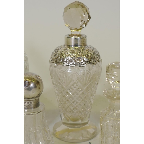 657 - An Edwardian silver mounted cut glass scent bottle, 15cm high, London 1908, J.H. Worrall Son & C... 