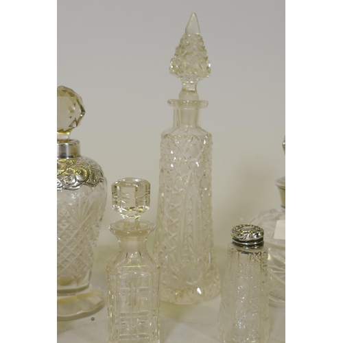 657 - An Edwardian silver mounted cut glass scent bottle, 15cm high, London 1908, J.H. Worrall Son & C... 