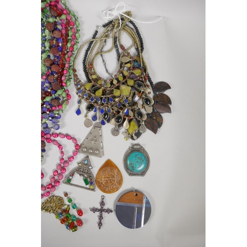 659 - A large quantity of good quality costume jewellery to include necklaces, pendants, bangles etc, 10kg