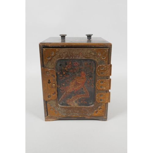 77 - An antique Japanese lacquer jewellery box with copper mounts, and three hidden drawers, decorated wi... 