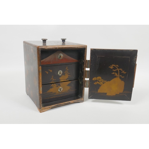 77 - An antique Japanese lacquer jewellery box with copper mounts, and three hidden drawers, decorated wi... 