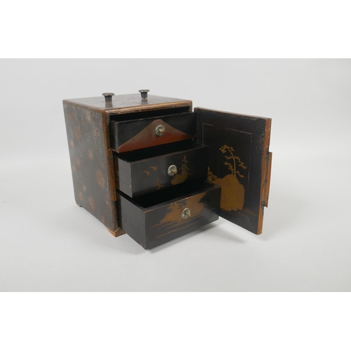 77 - An antique Japanese lacquer jewellery box with copper mounts, and three hidden drawers, decorated wi... 