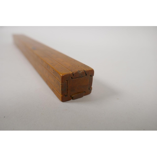 8 - An C18th Excise Officer's boxwood slide rule with four slides inscribed with weights and measures, a... 