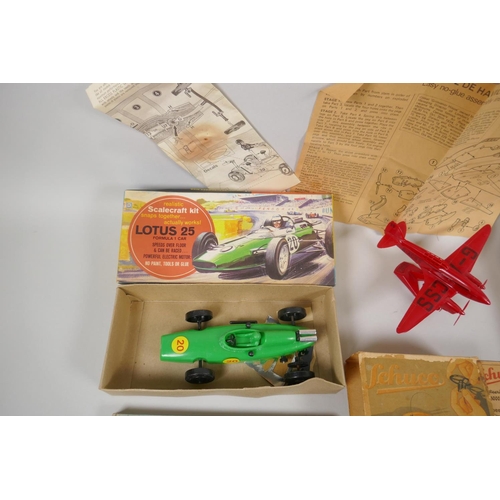 80 - A collection of vintage model kits and toys, to include a Schuco Telesteering Car 3000, an Airfix B.... 