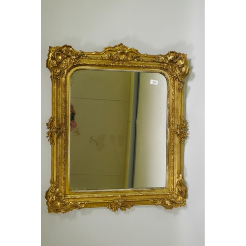 808 - A good C19th giltwood and composition picture frame with pierced crest and corners and arched rebate... 