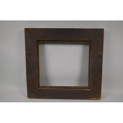 880 - An C18th carved giltwood picture frame with C scroll decoration, rebate 32 x 35cm