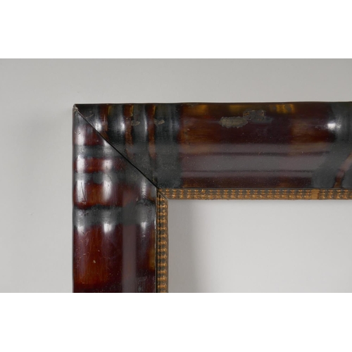 887 - An early C20th Dutch style ebonised and burnished picture frame with reeded decoration, 58 x 47cm