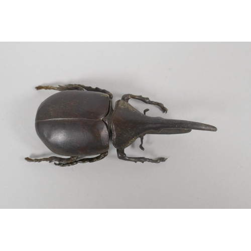 95 - A Japanese style bronze okimono of a hercules beetle, 10cm